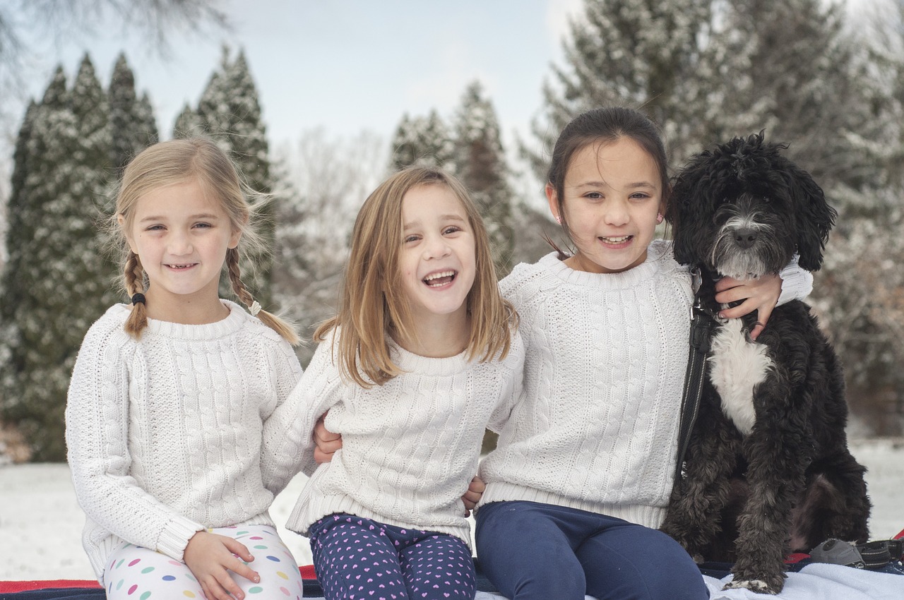 sisters  dog  snow free photo