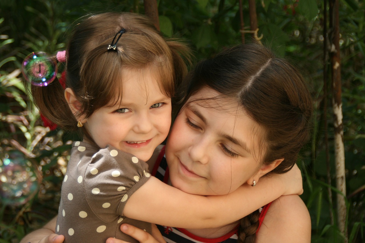 sisters love portrait free photo