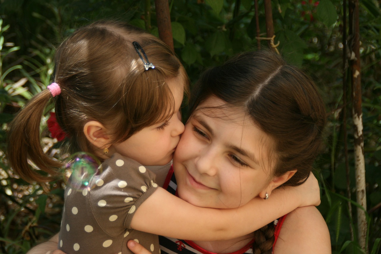 sisters love portrait free photo