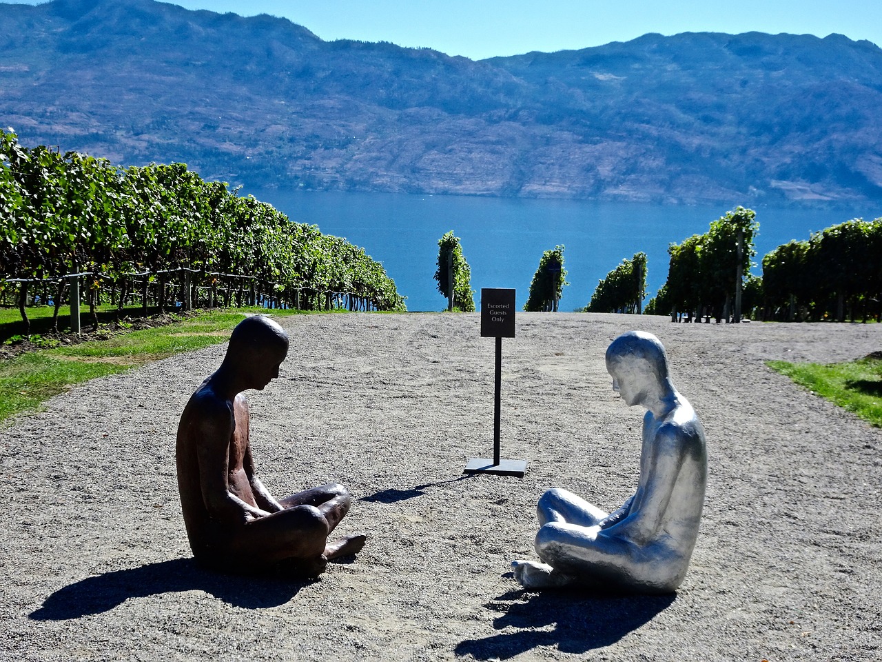 sitting sculptures statues free photo