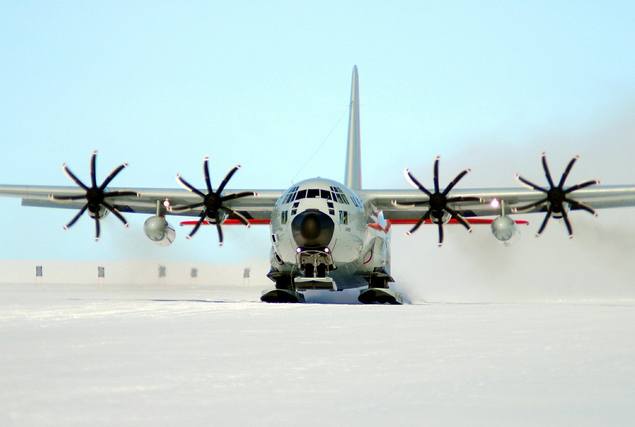 ski equipped cargo plane military aircraft free photo