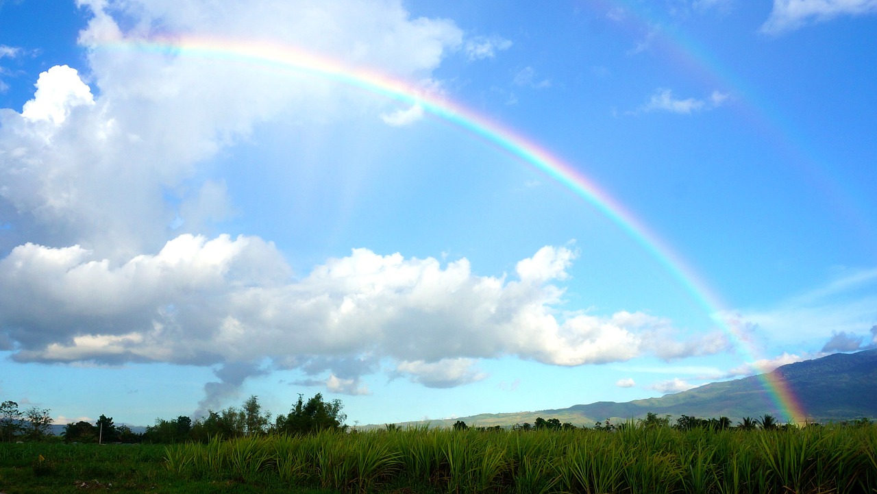 sky rainbow clouds free photo