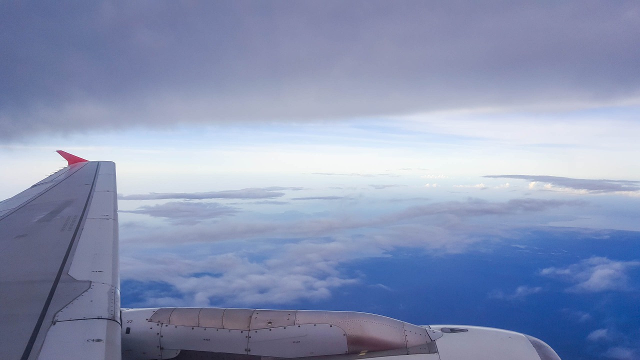 sky airplane clouds free photo