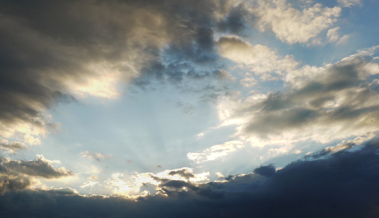 sky clouds sunbeam free photo