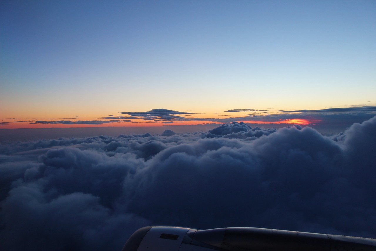 sky flying clouds free photo