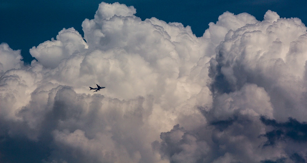 sky plane cloud free photo