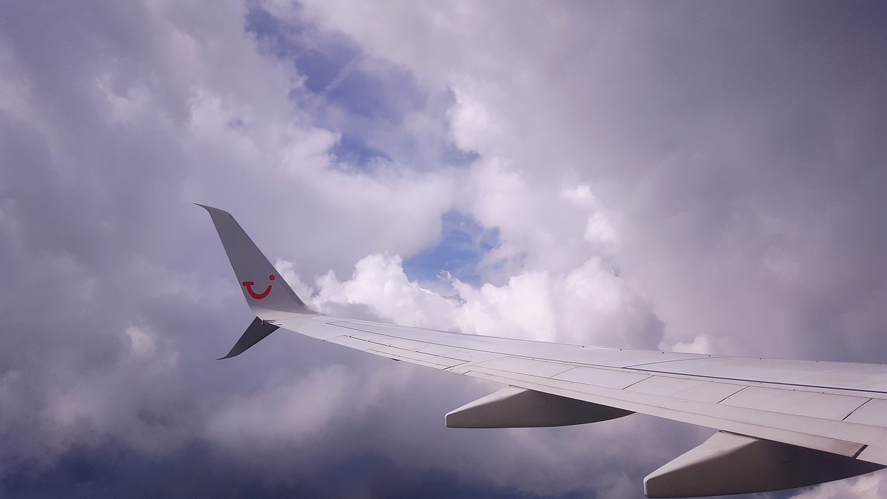 sky clouds aircraft free photo