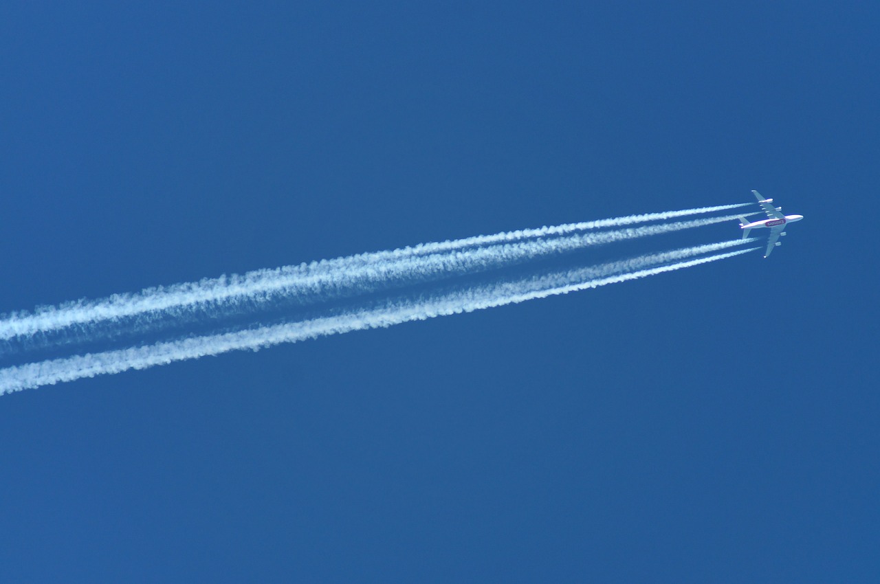 sky airliner condensation trails free photo