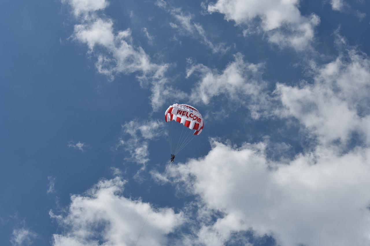 sky  clouds  parachute free photo