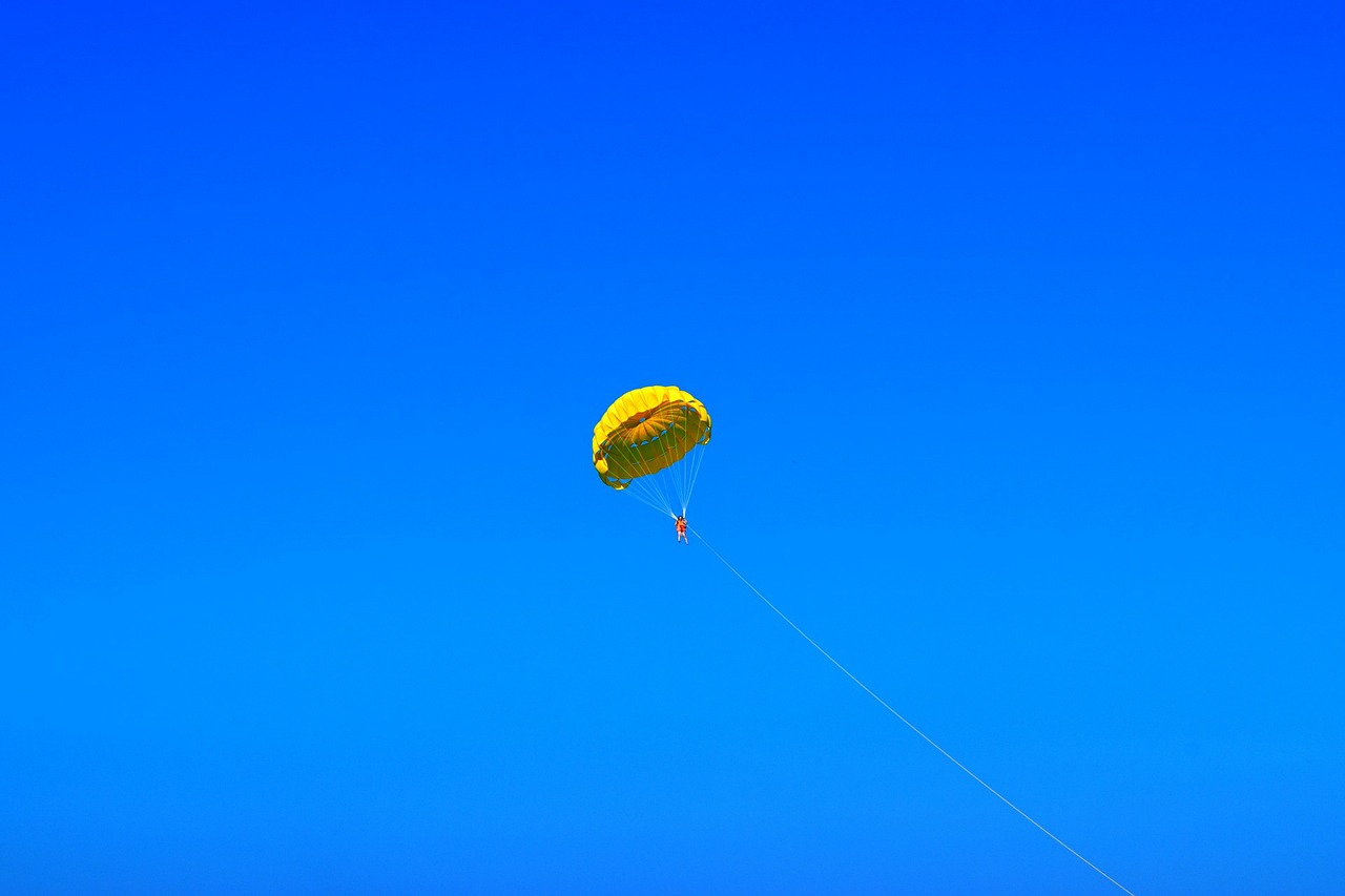 sky blue parachute free photo