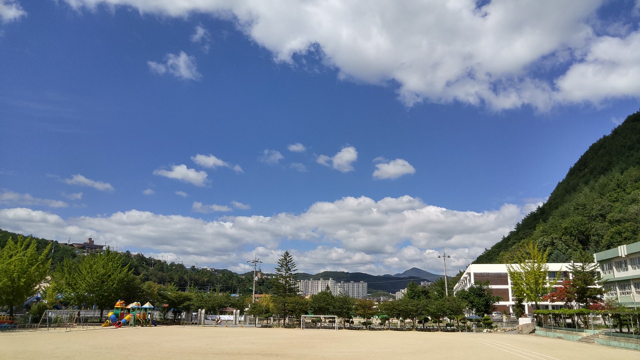 autumn sky white clouds school scenery free photo