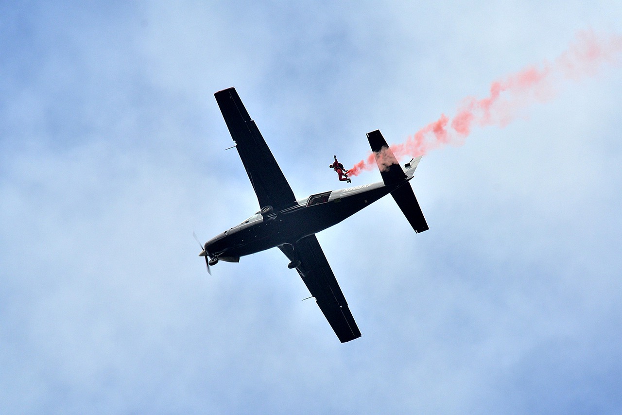 sky diving  plane  parachute free photo