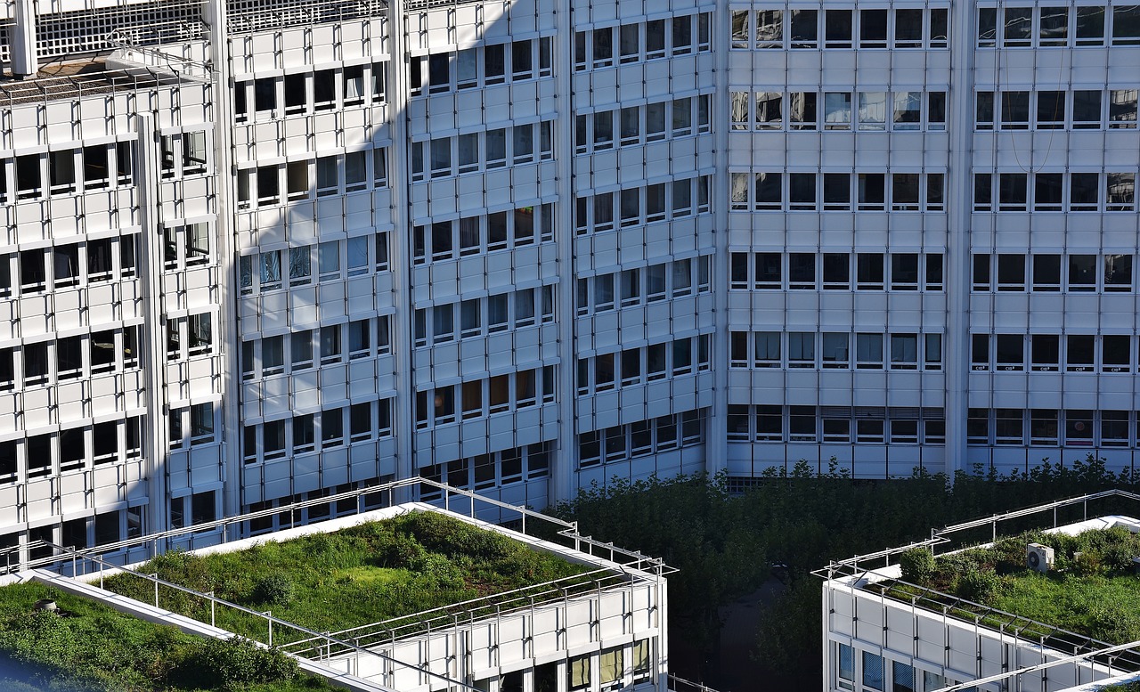 skyscraper building complex green roof free photo