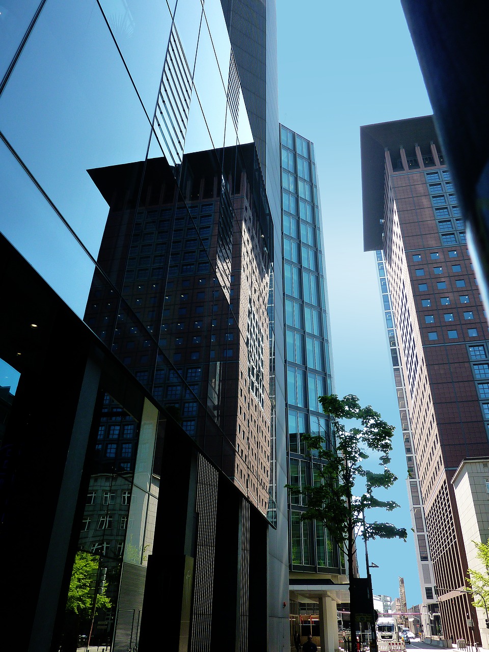 skyscraper reflection building free photo