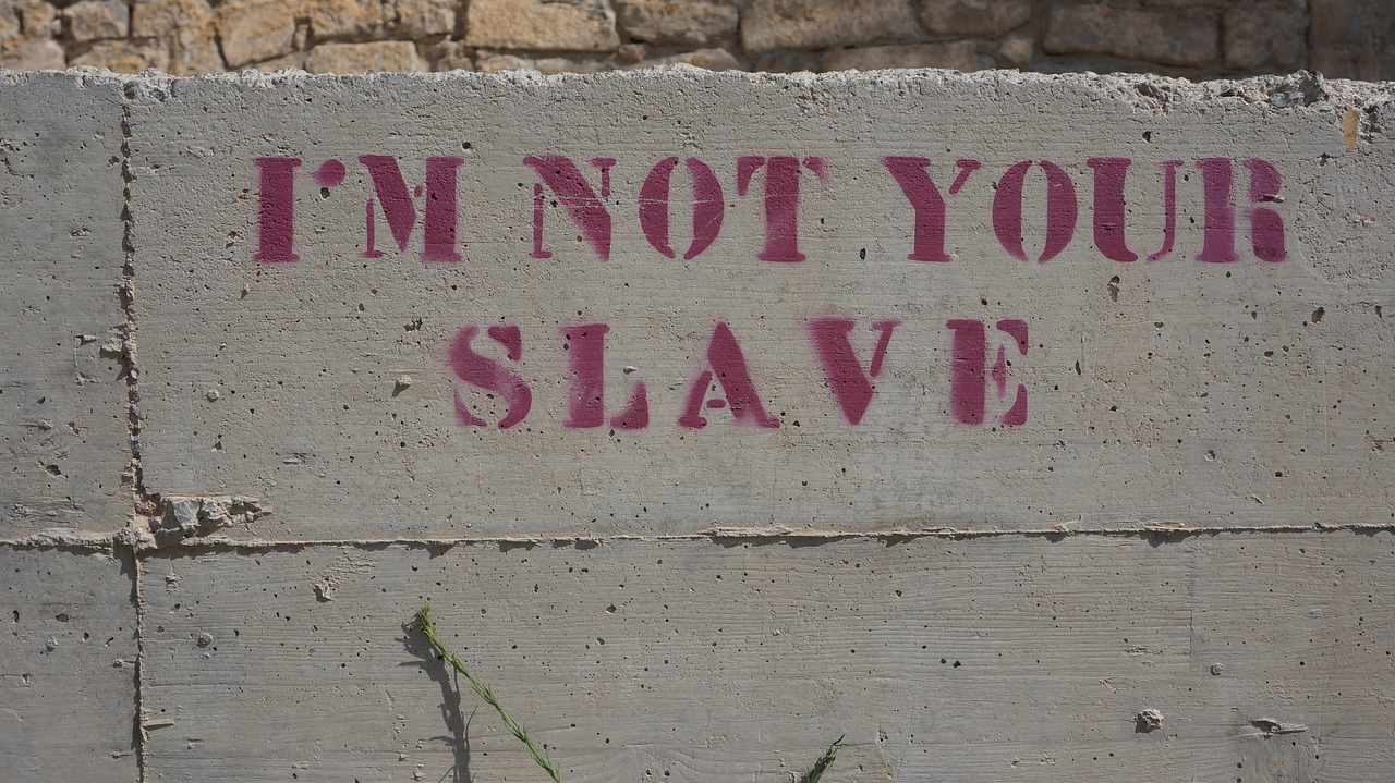 slave wall saying free photo