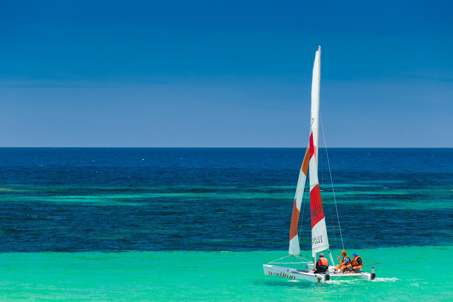 blue boat catamaran free photo