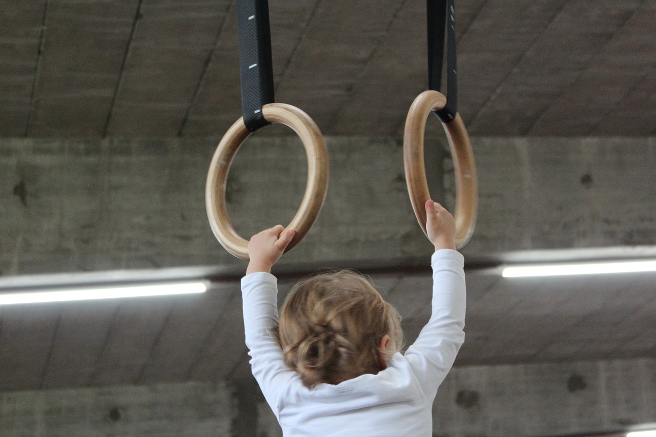small child sports equipment rings free photo