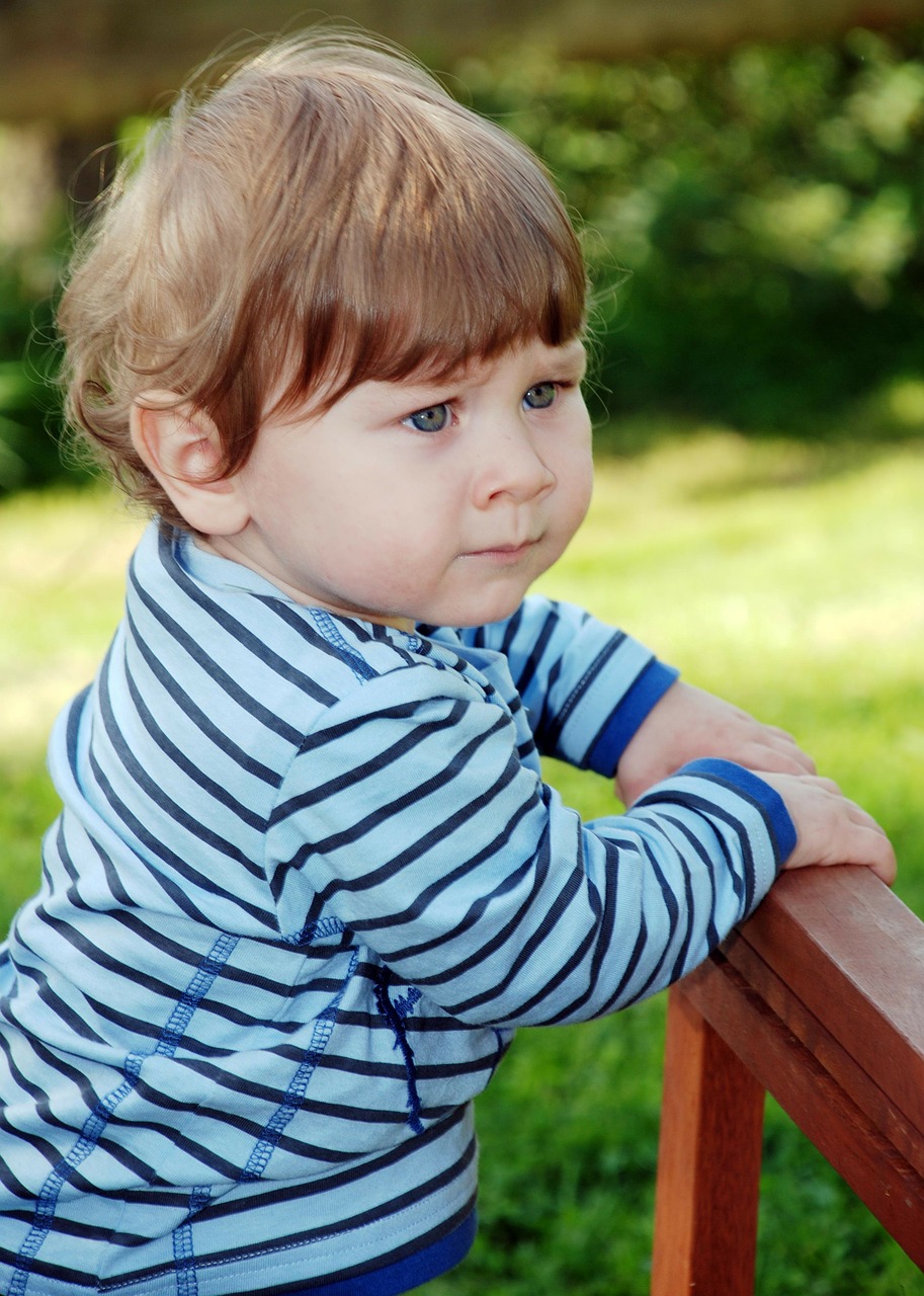 small child boy skeptical free photo