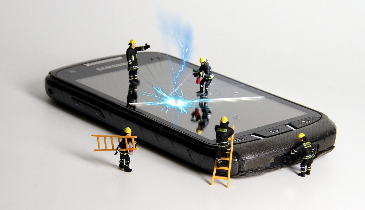 smartphone  fire  miniature figures free photo