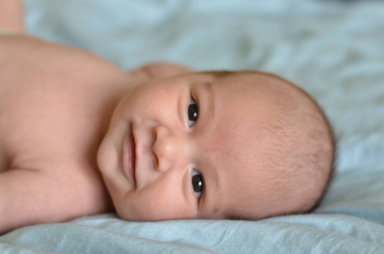 smiling baby boy free photo