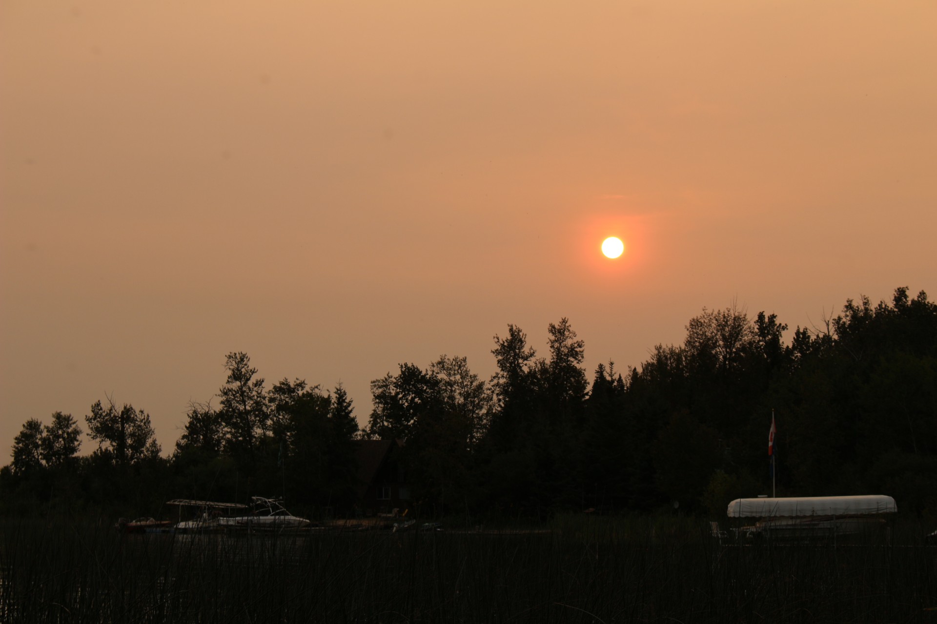 smoky orange sunset free photo