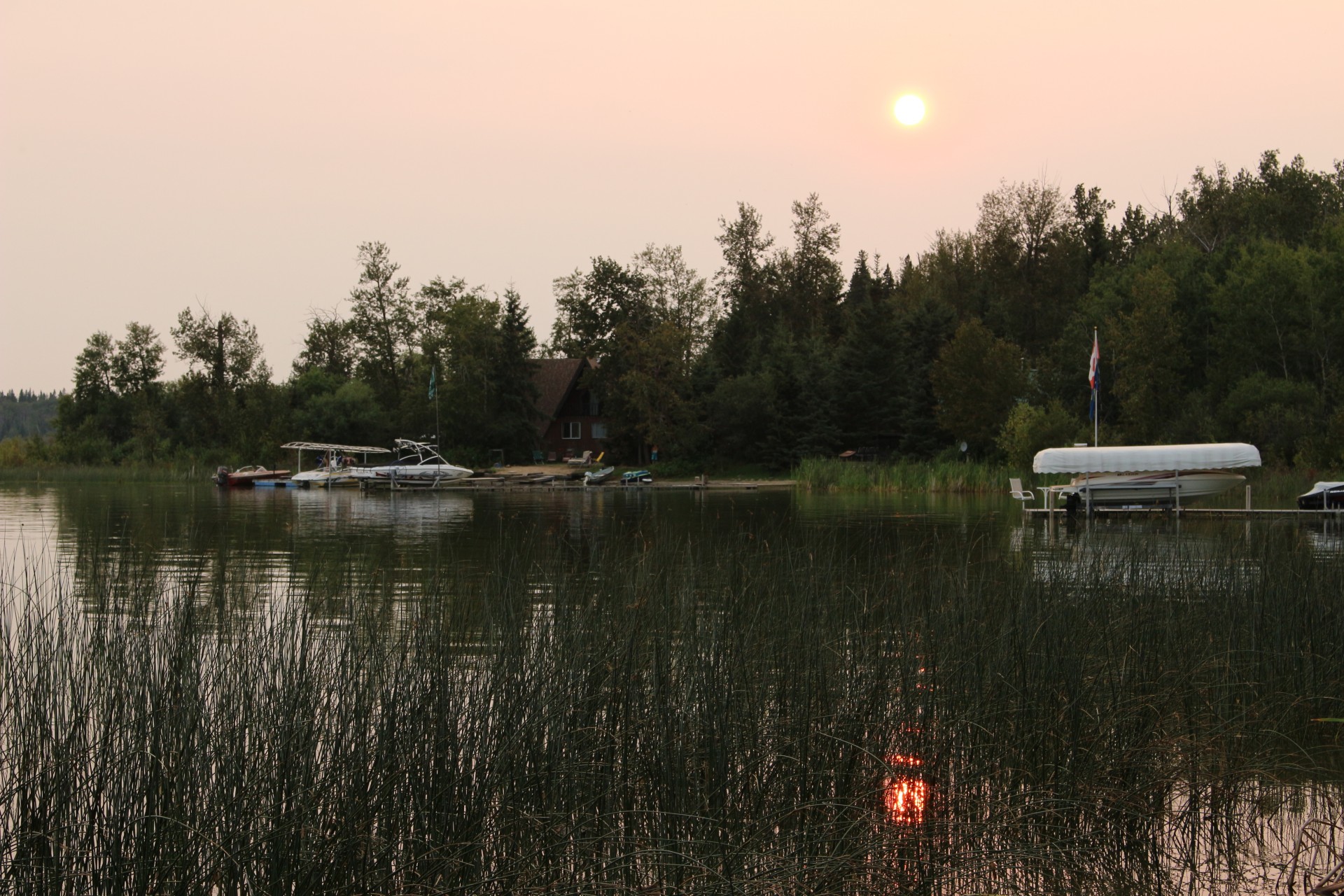 smoky orange sunset free photo