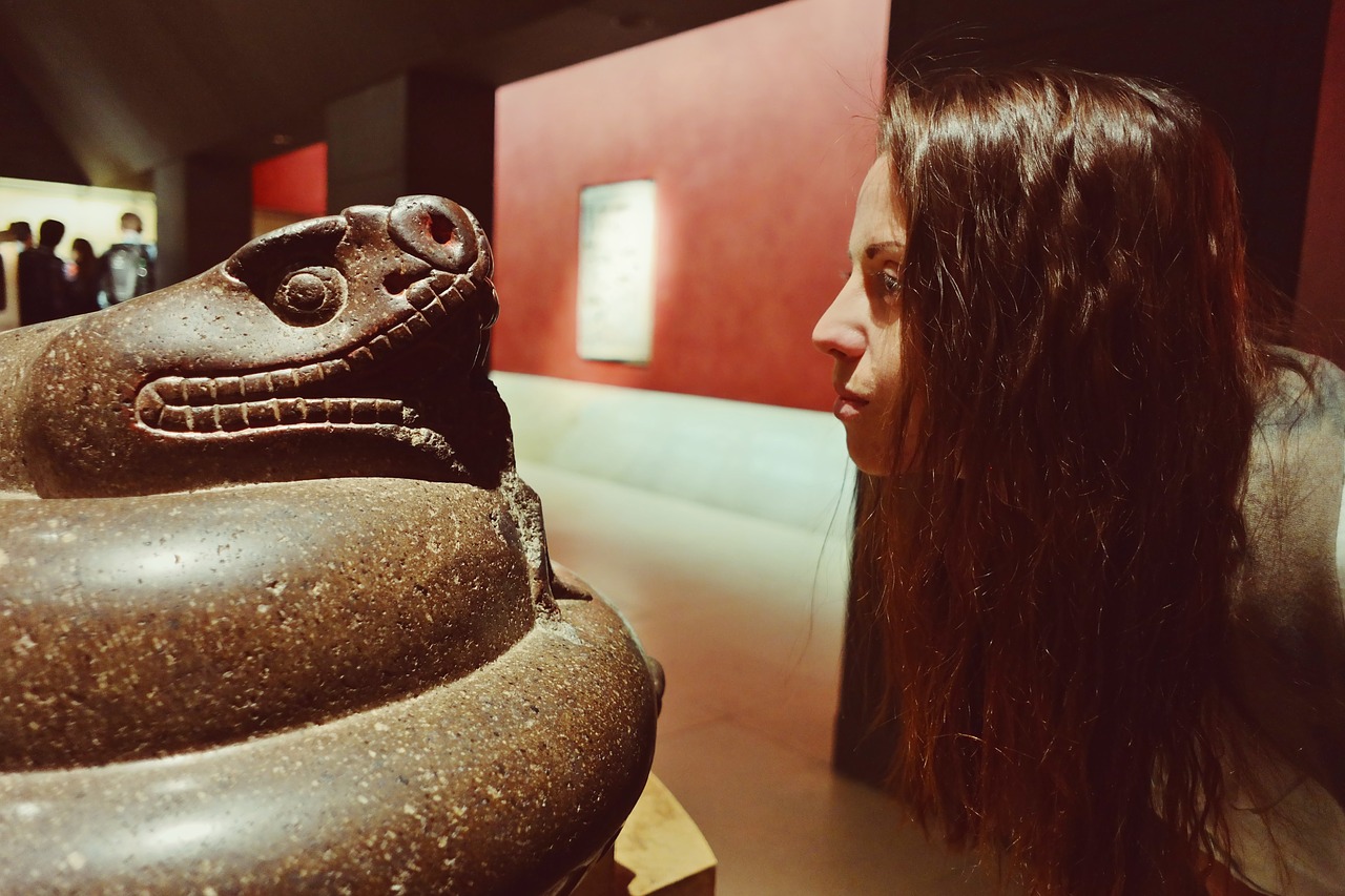 snake sculpture woman free photo