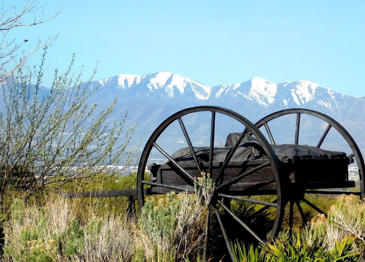 snow capped mountains  wagon wheels  utah free photo