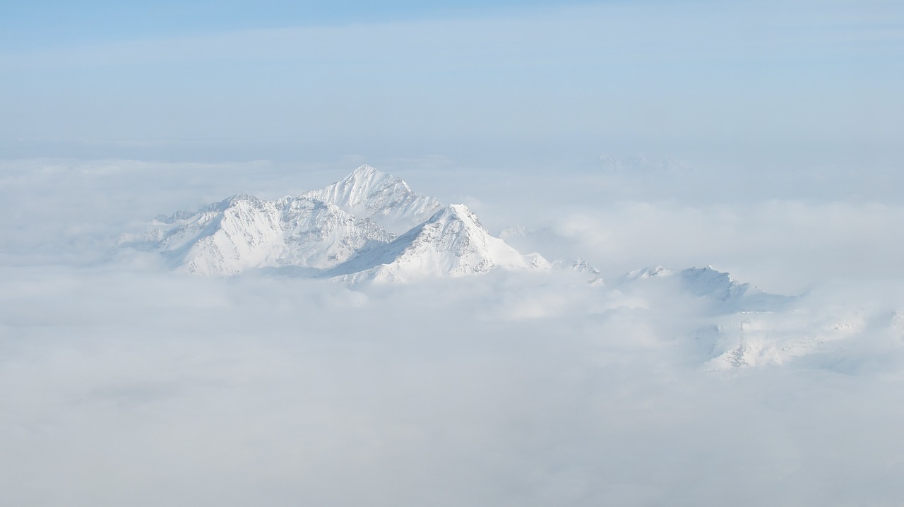 snow mountain aerial the yellow dragon free photo