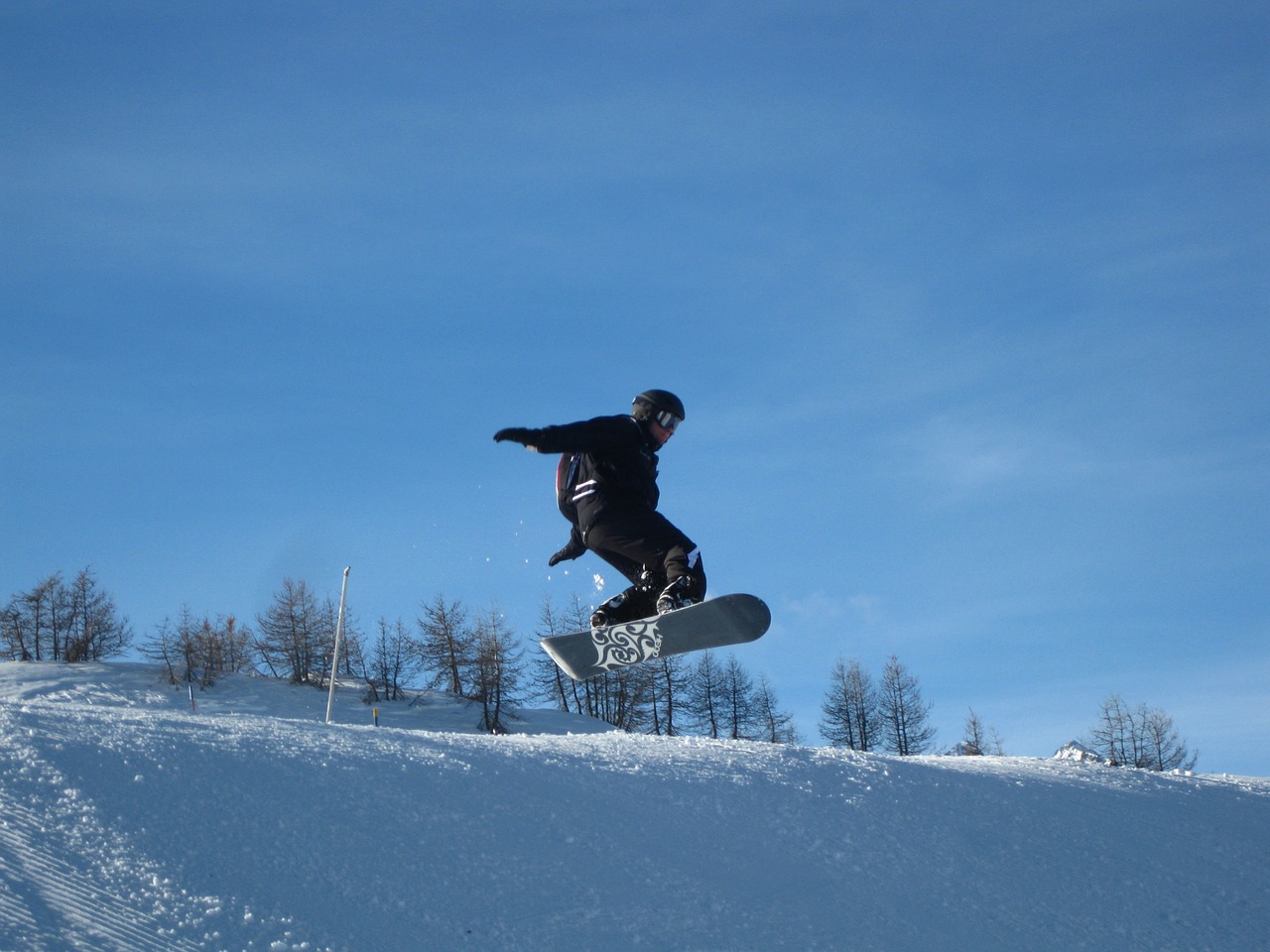 snowboard jump snow free photo