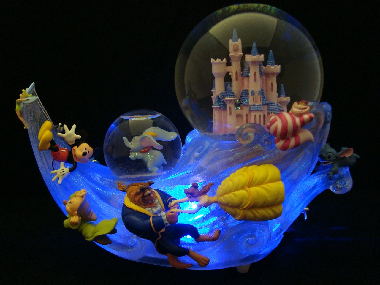 snowglobes disney collectible action figures free photo