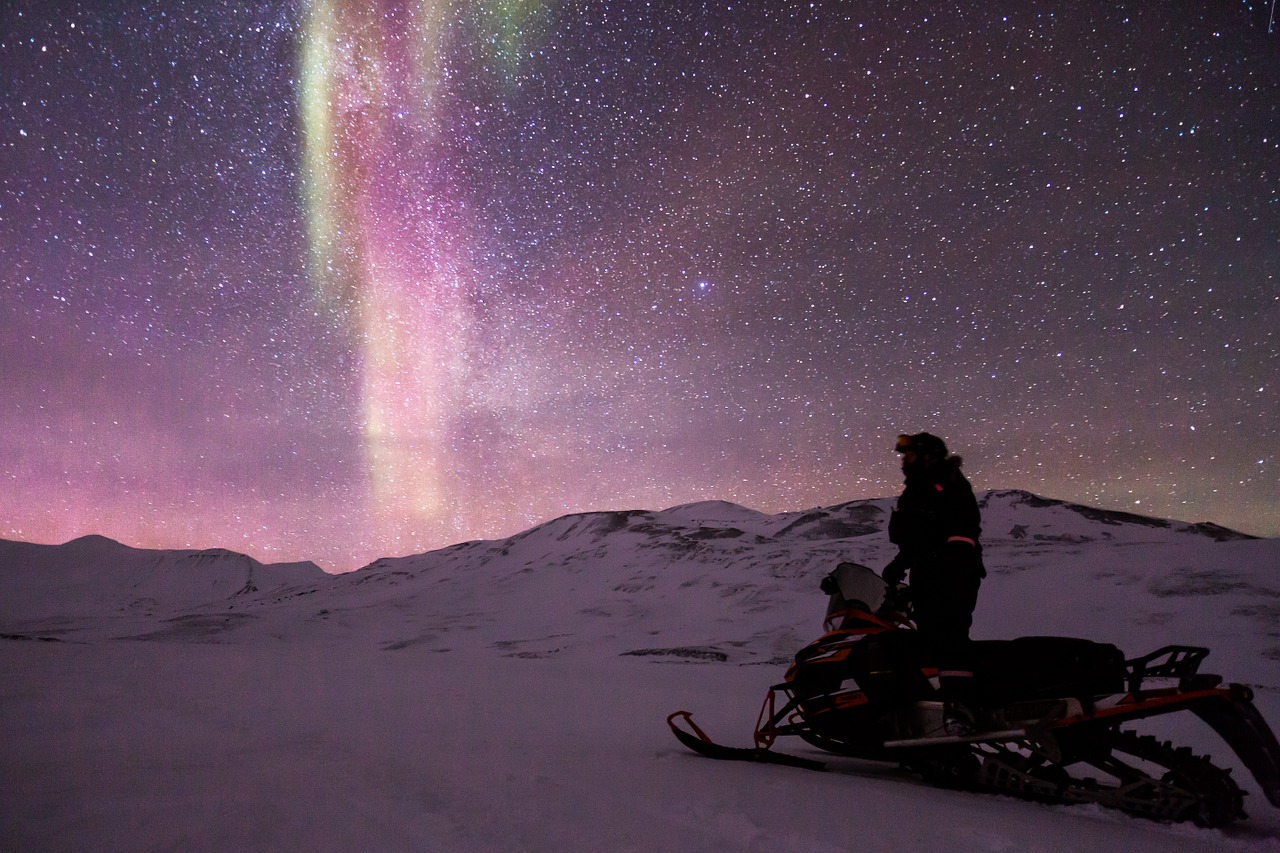 snowmobile aurora auroras free photo