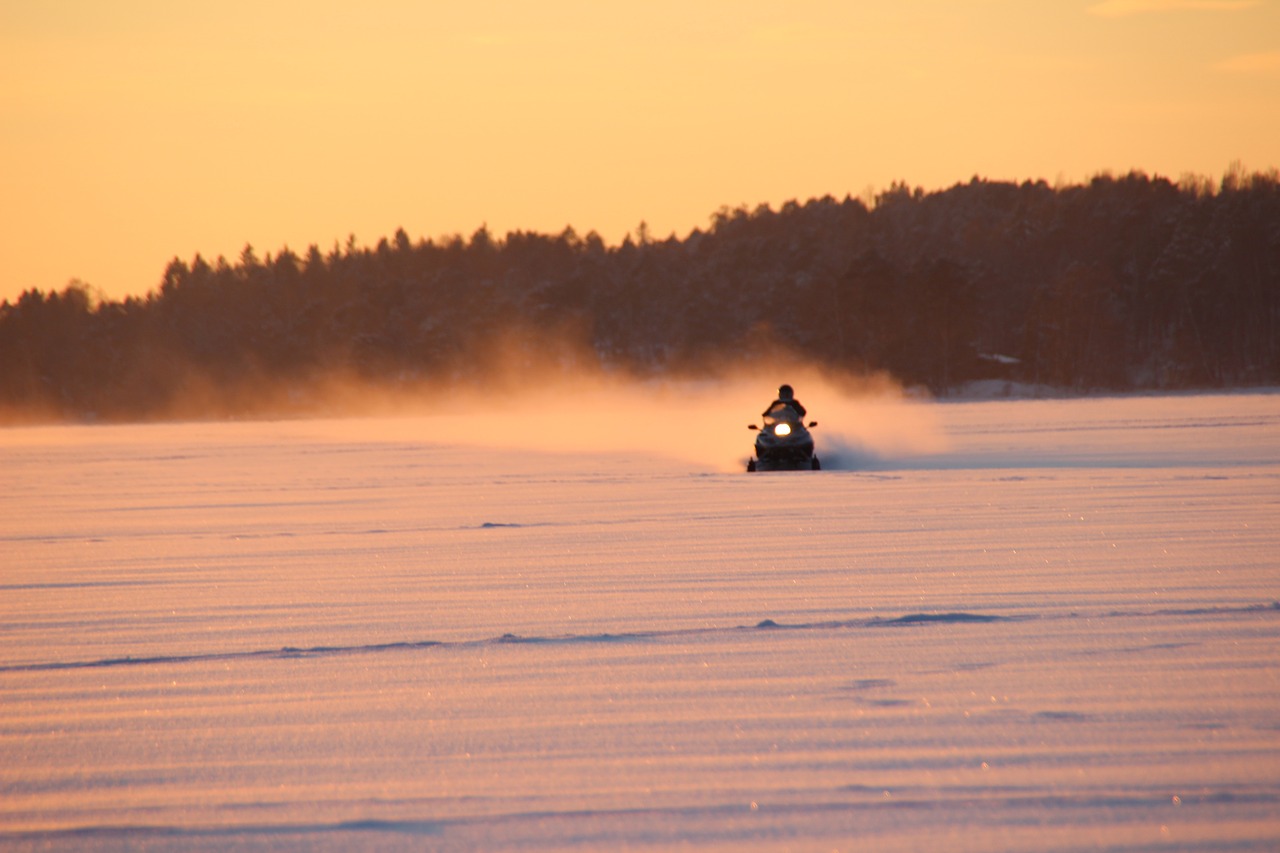 snowmobile  sunset  finnish free photo