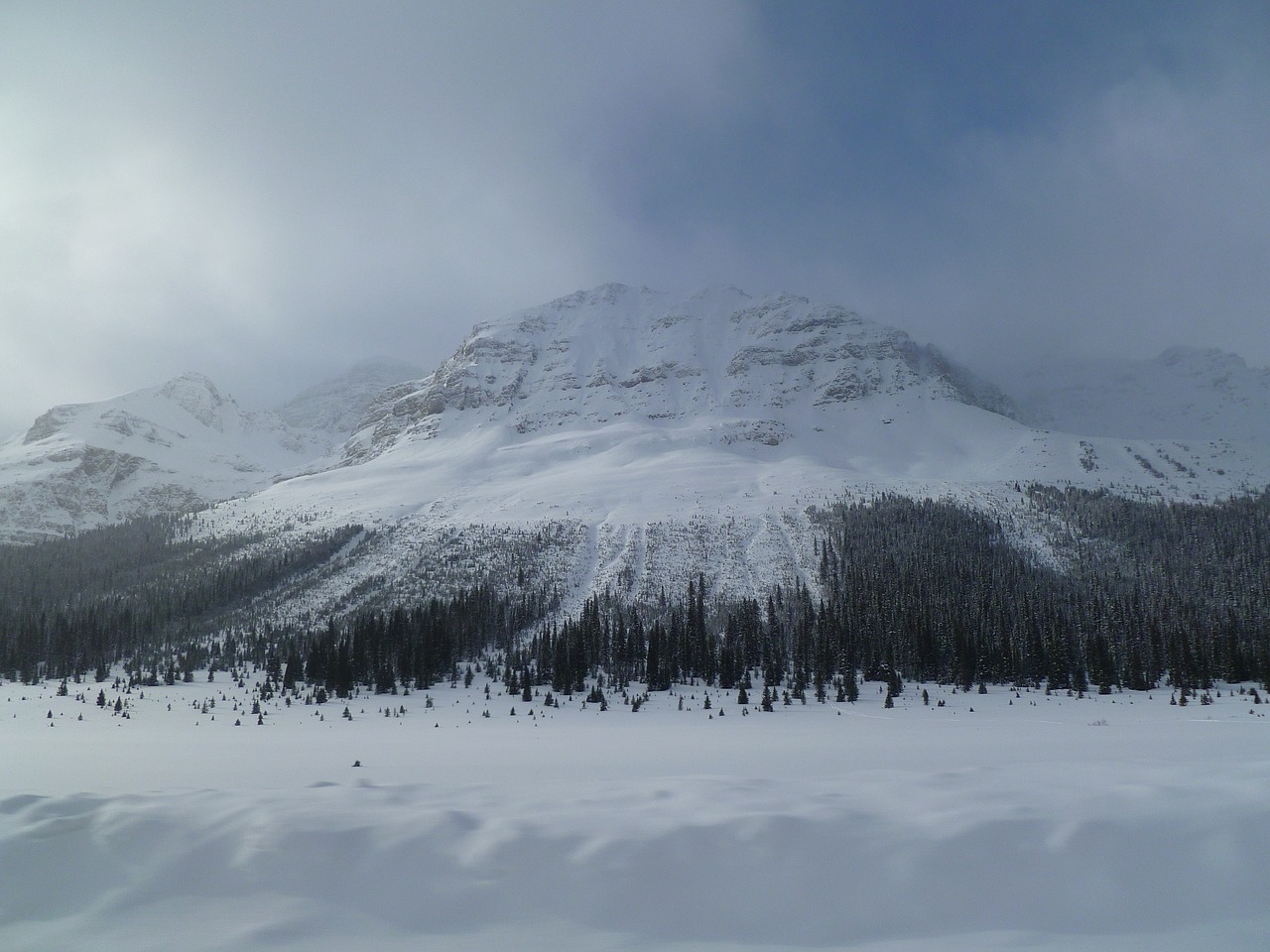 snowy mountain mysterious mountain looming mountain free photo