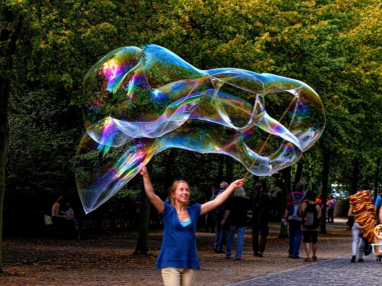 soap bubble giant bubble woman making soap bubbles free photo