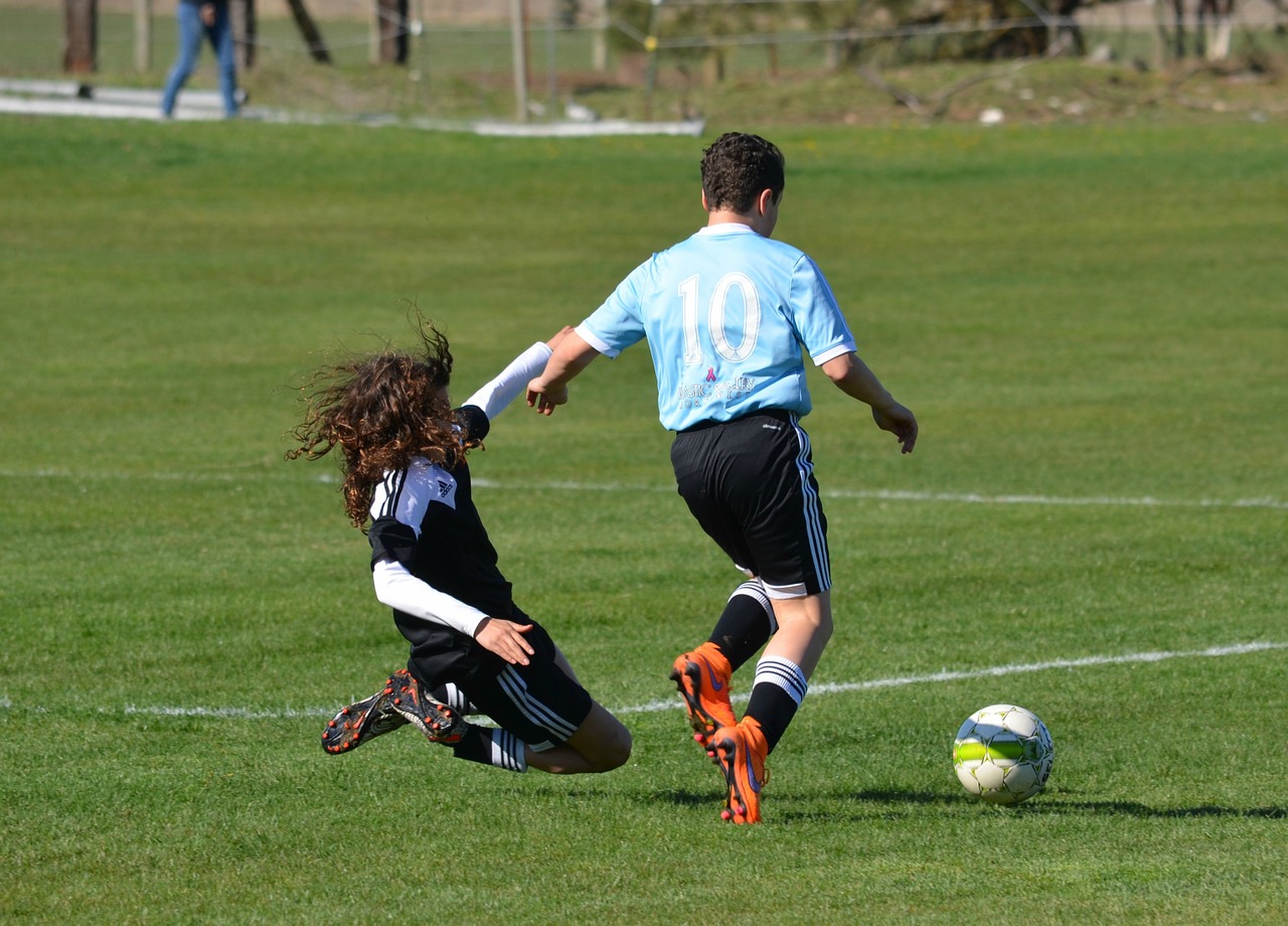 soccer tackle defense free photo