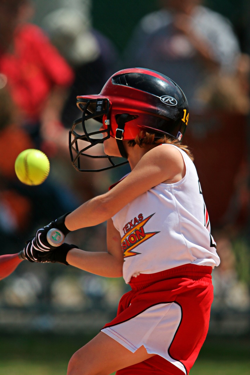 softball batter swinging free photo