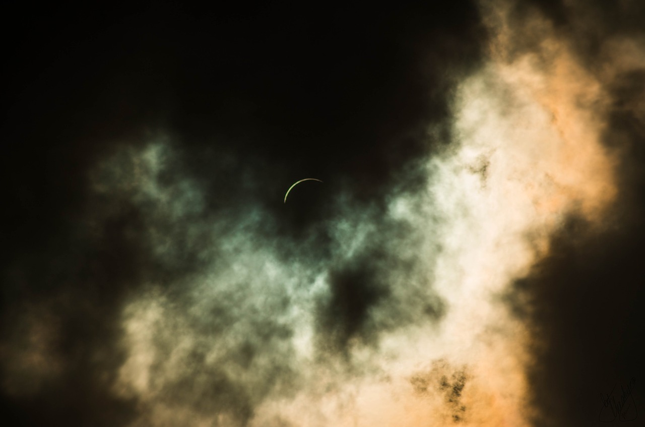 solar eclipse sun clouds free photo