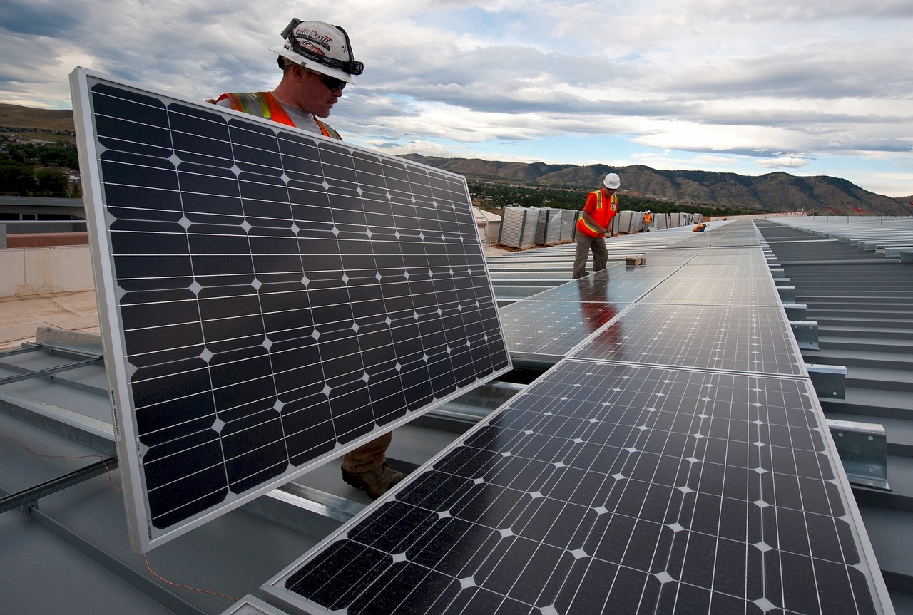 solar panels installation workers free photo