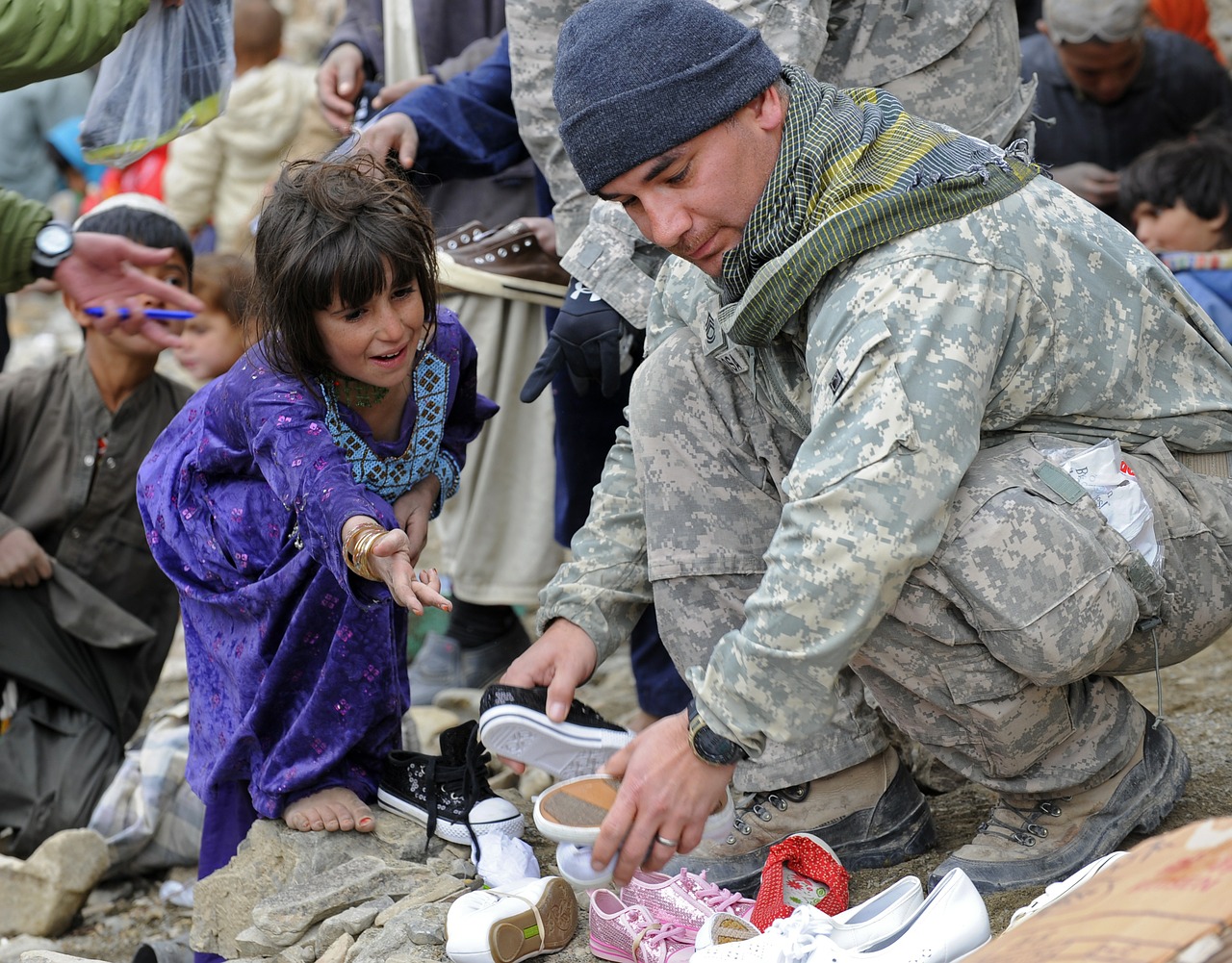 soldier help child free photo