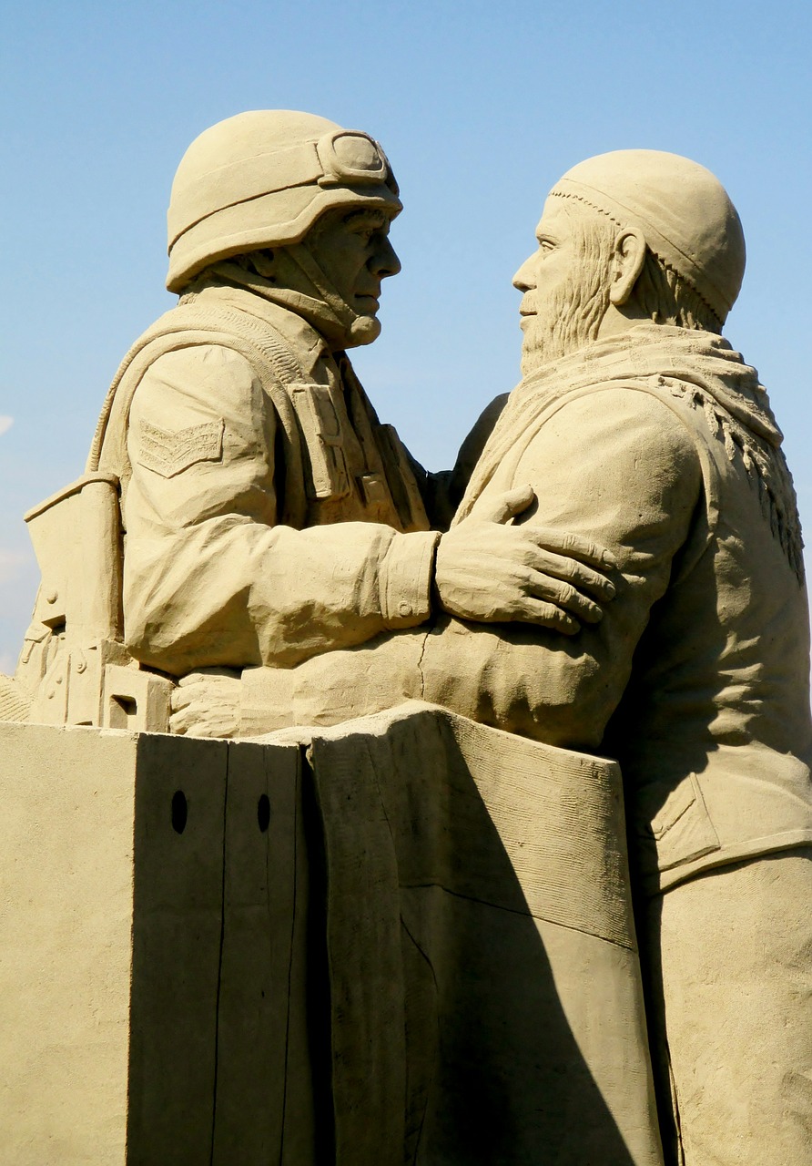 soldiers sand sculpture art free photo