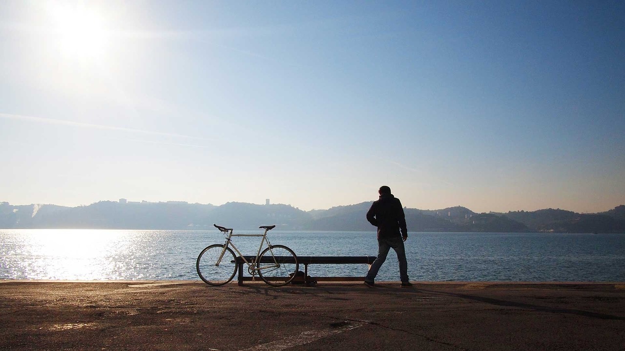 solitary bicycle man free photo