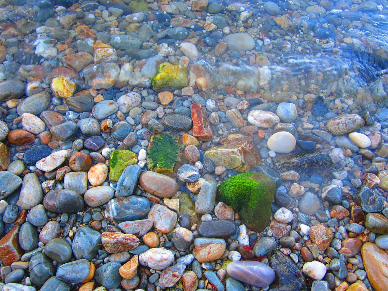 stones colorful sea free photo