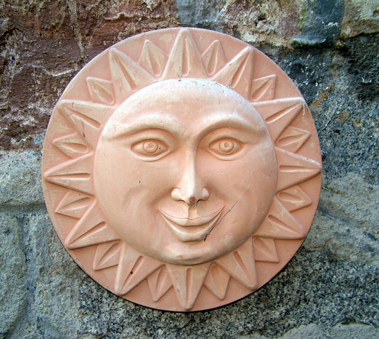 sun terracotta decoration free photo