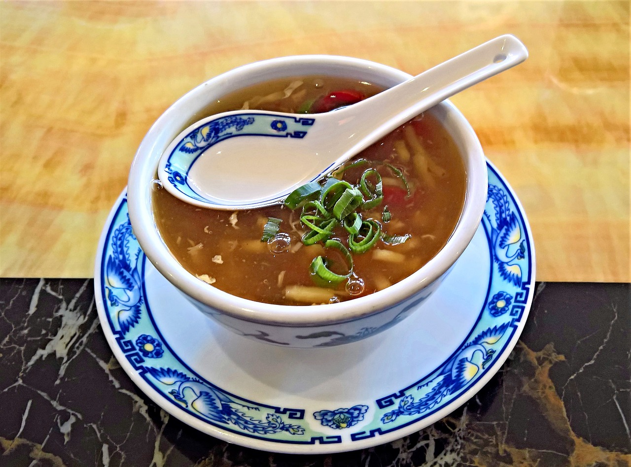 soup  consommé cup  chinese sour spicy soup free photo