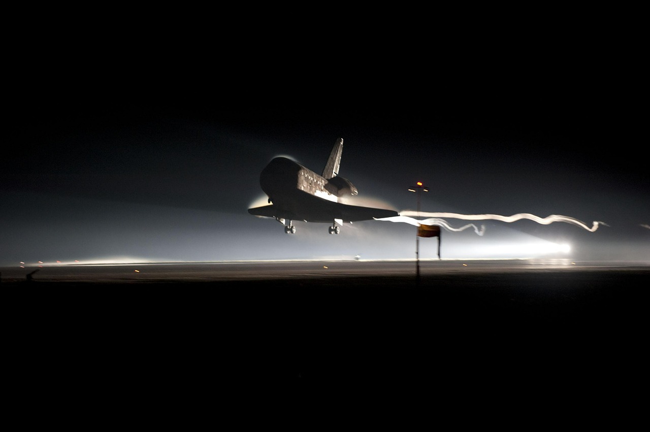 space shuttle landing night free photo