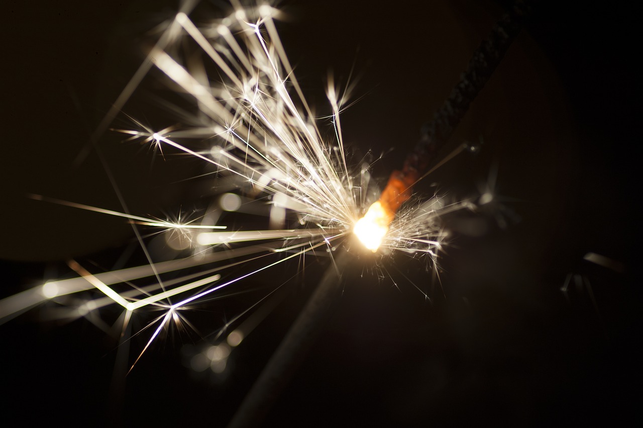 sparkler  new year  sparks free photo