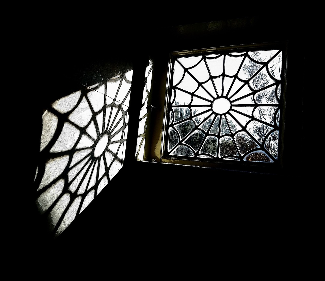 spider web window  leaded window  vintage window free photo