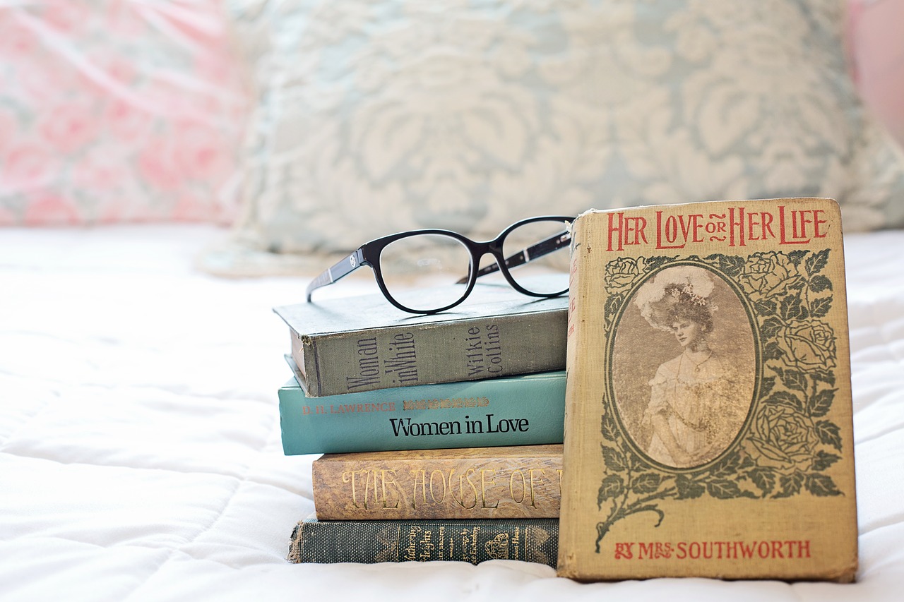 stack of books  vintage books  women's novels free photo