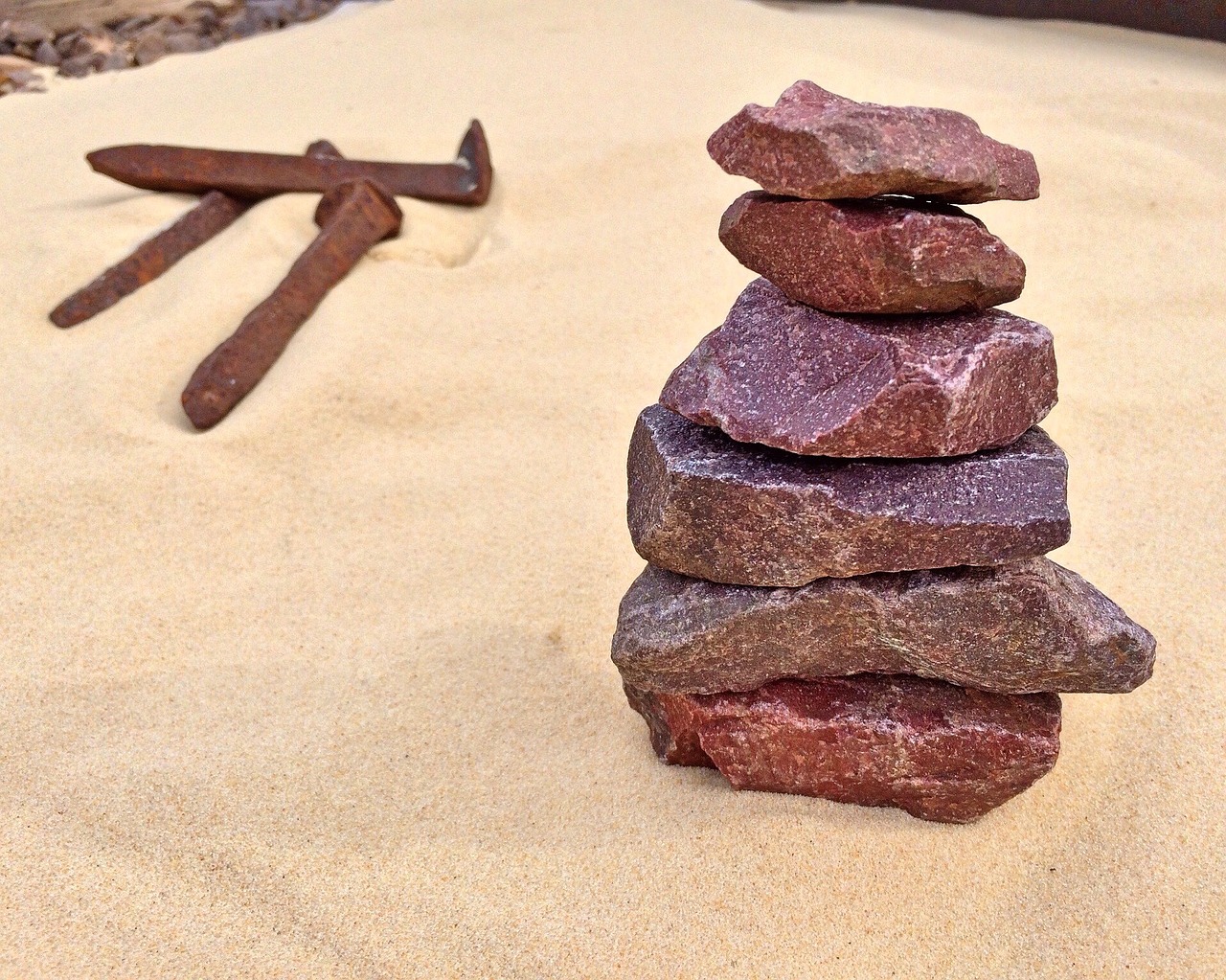 stacked stones railroad sand free photo
